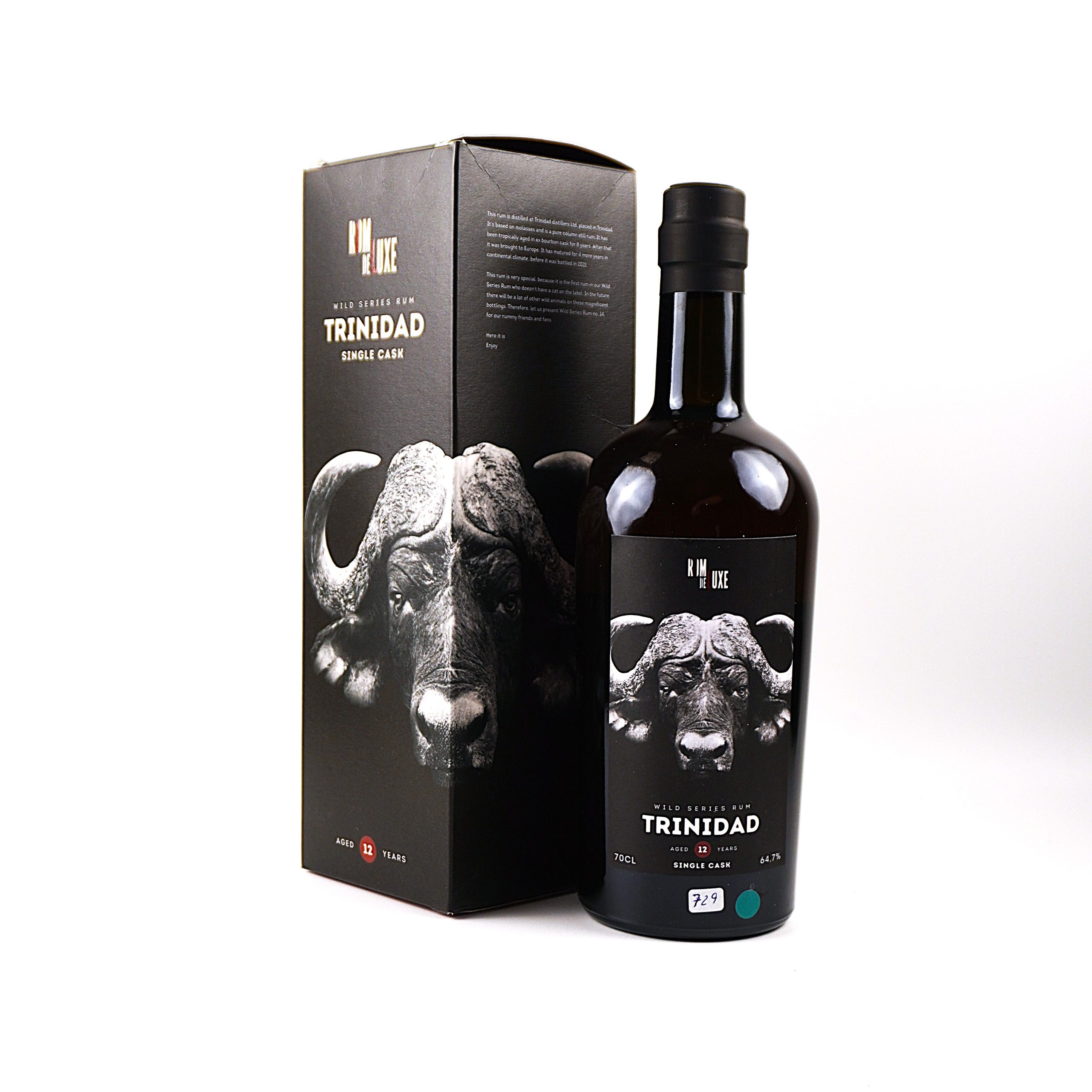 Trinidad Distillers 2009 – Rom de Luxe Wild Series Nr. 14, 12 Jahre, 64,7 % Vol., 0,7 Liter. Frontalansicht mit Originalkarton, sehr guter Füllstand, Flasche, Kapsel und Etikett in sehr gutem Zustand.