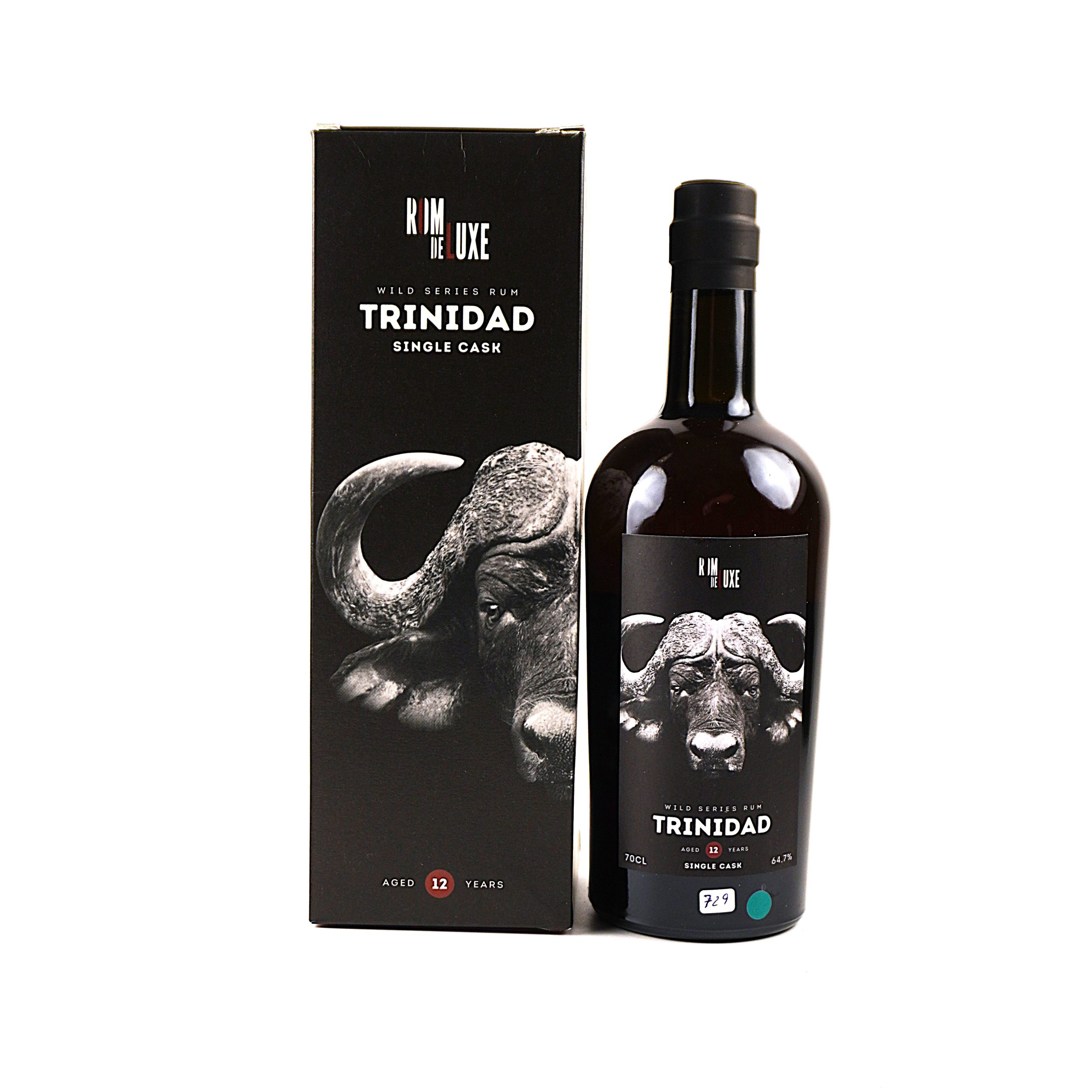 Trinidad Distillers 2009 – Rom de Luxe Wild Series Nr. 14, 12 Jahre, 64,7 % Vol., 0,7 Liter. Frontalansicht mit Originalkarton, sehr guter Füllstand, Flasche, Kapsel und Etikett in sehr gutem Zustand.